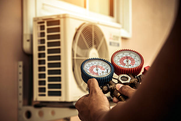 Professional Heat Pump Repair technician working in Gilbert, IA